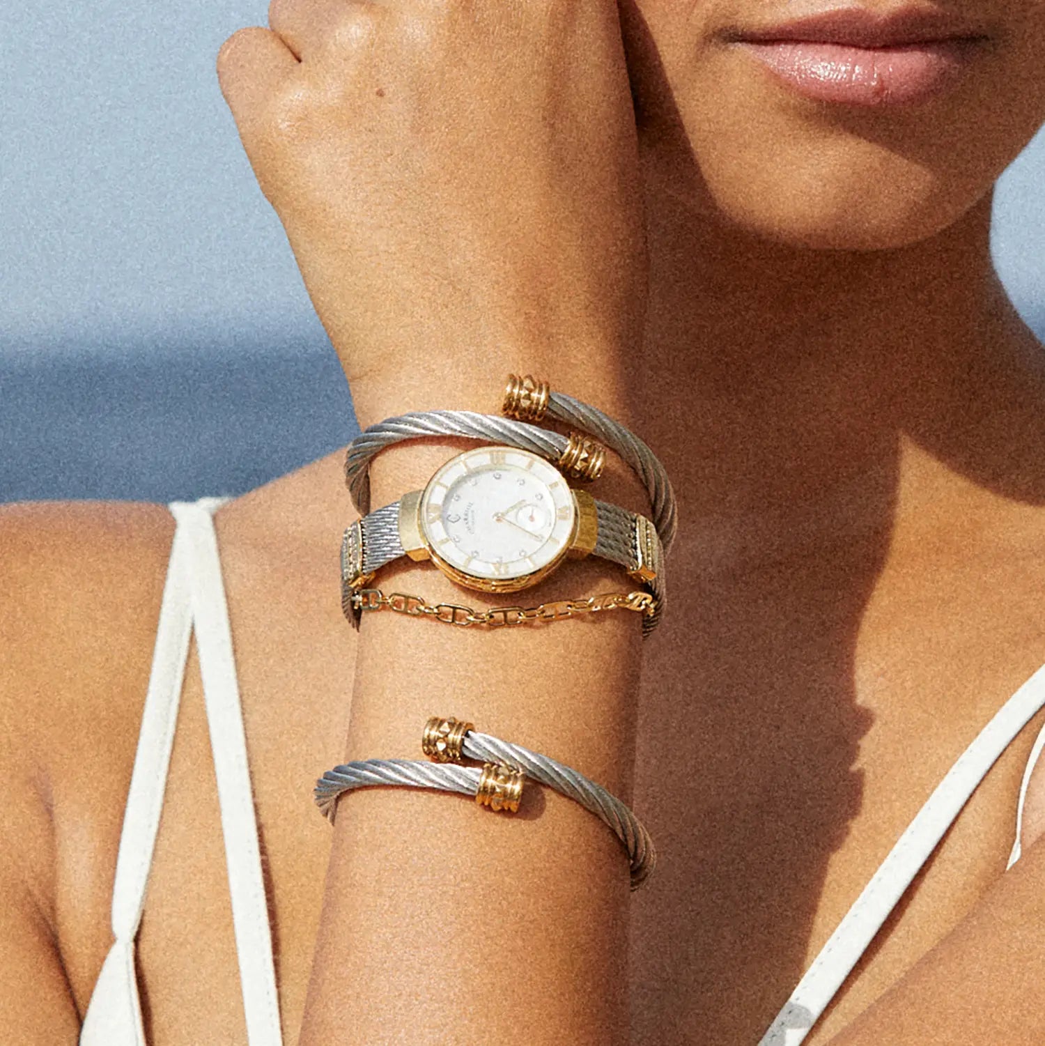 ST TROPEZ, 25MM, QUARTZ CALIBRE, MOTHER-OF-PEARL WITH 11 DIAMONDS DIAL, YELLOW GOLD PVD BEZEL, STEEL CABLE BRACELET - Charriol Geneve - Watch